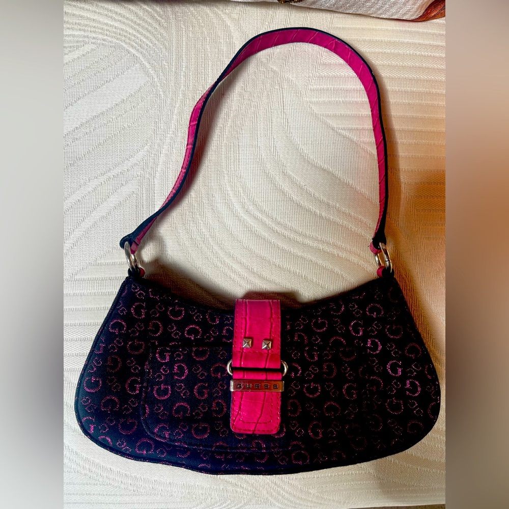 Small guess over the shoulder pocketbook.